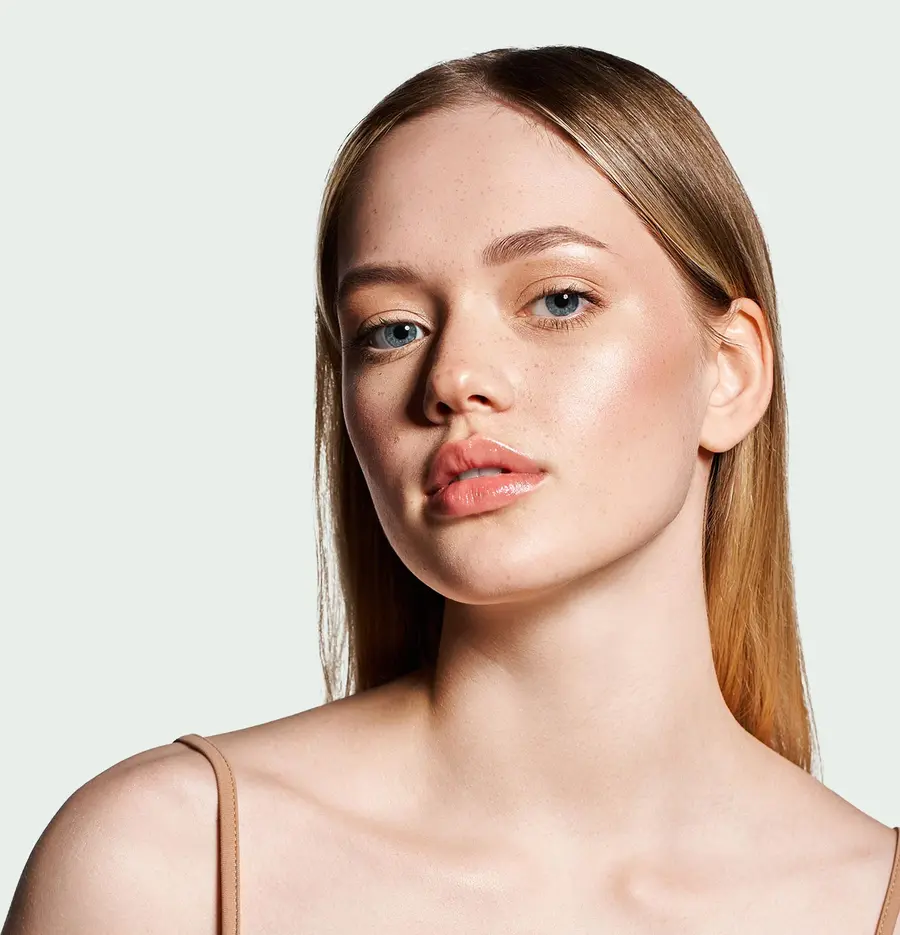 Woman with smooth, radiant skin for daily skincare hydration